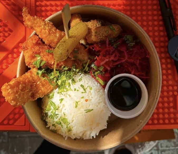 Bowl of fried chicken seen from above